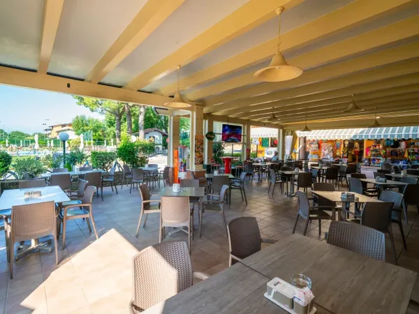 Een restaurant op Roan camping Union Lido Mare.