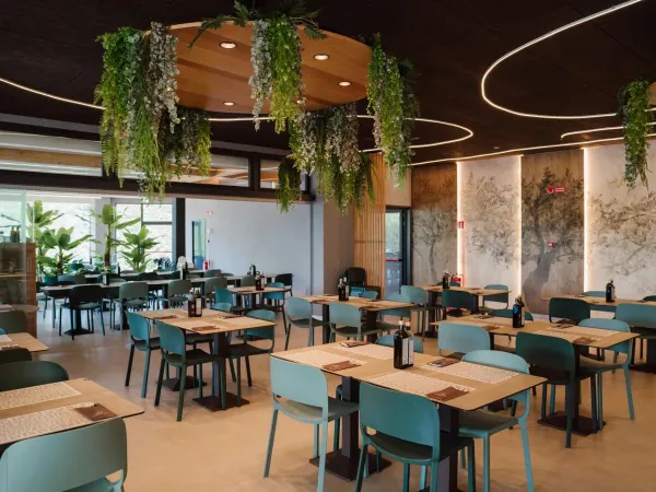 Het sfeervolle nieuwe restaurant op Roan camping Pra'delle Torri.